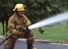 17470-a-firefighter-with-a-water-hose-pv.jpg