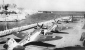 HMS Triumph with Supermarine Seafires on the flight deck in the late 1940s.jpg